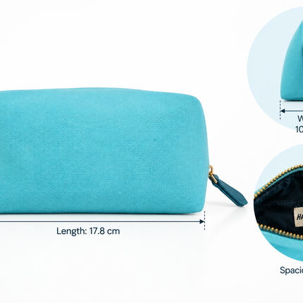 Aqua blue utility pouch for women styled on neutral flatlay