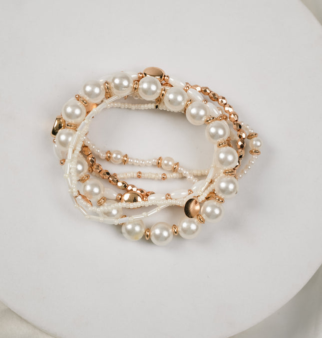 Multi-Strand Pearl and Gold Beaded Bracelet Set Styled on Wrist - Hashtack