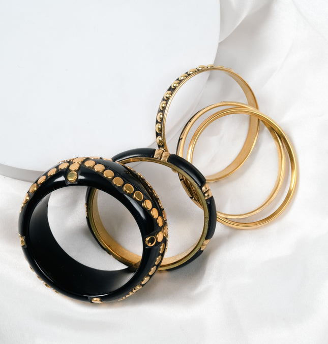 Black and Gold Studded Resin Bangle Stack Styled on Wrist - Hashtack