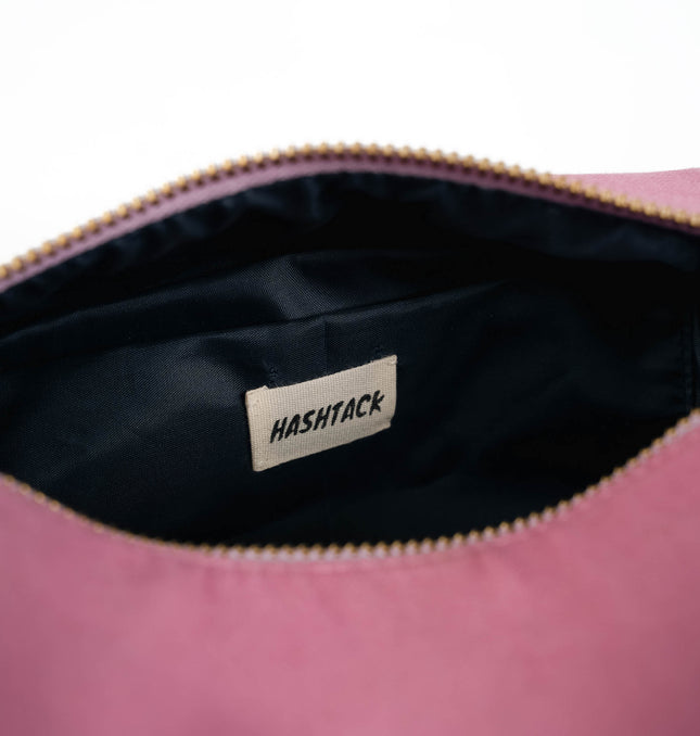 Dusty pink utility pouch for women side profile