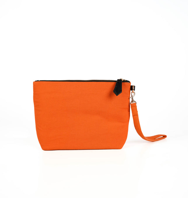 Orange wristlet pouch for women with gold-tone zipper