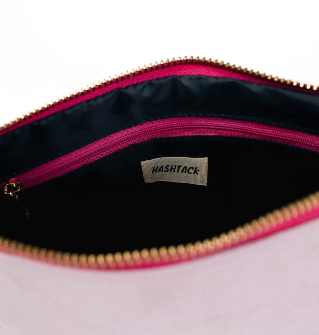 Lilac utility pouch for women showing strap detail