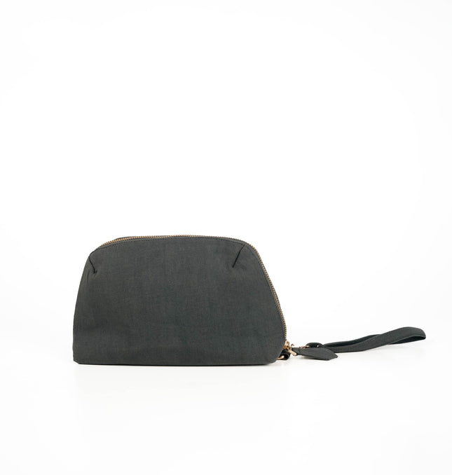 Front view of charcoal black utility pouch in Charcoal Black with gold zipper and textured canvas