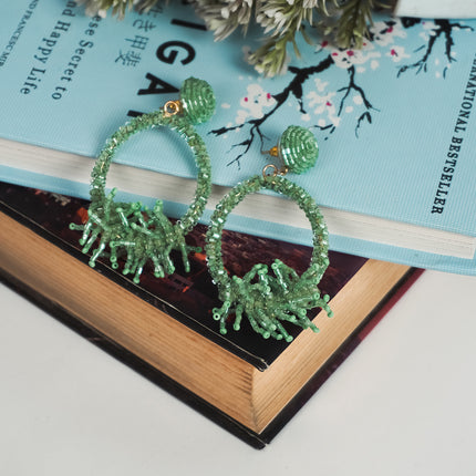 Vibrant Green Beaded Hoop Earrings with Fringe Accents