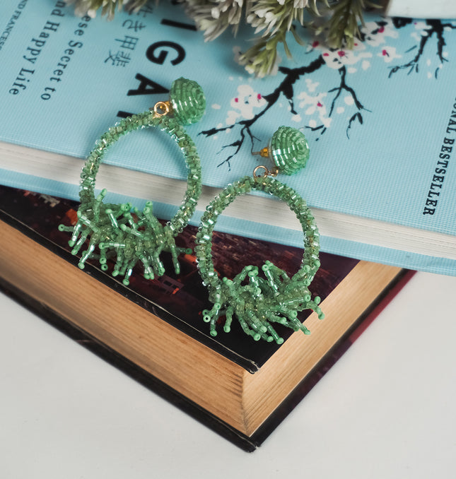 Vibrant Green Beaded Hoop Earrings with Fringe Accents
