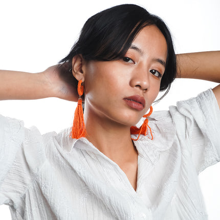 Fiery Orange Tassel Hoop Earrings